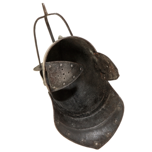 493 - A CROMWELLIAN LOBSTER TAIL HELMET the skull formed in two halves with overlapping internal join, the... 