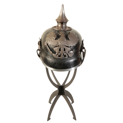 497 - A WWI IMPERIAL GERMAN PICKELHAUBE the leather skull with original lining and leather chin strap,  sp... 