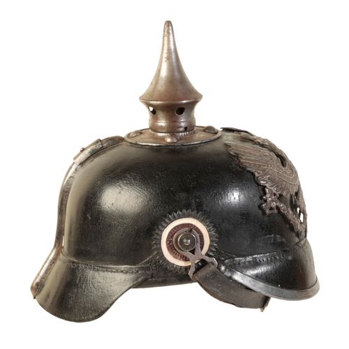 497 - A WWI IMPERIAL GERMAN PICKELHAUBE the leather skull with original lining and leather chin strap,  sp... 