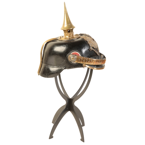 498 - A WWI GERMAN OFFICERS PICKELHAUBE the leather skull with original leather lining, leather and brass ... 