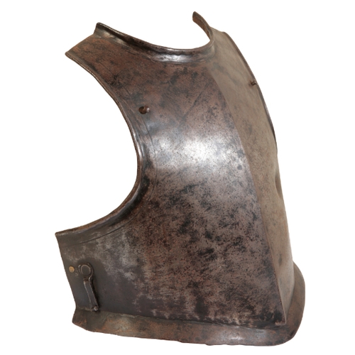 506 - A 17TH CENTURY ENGLISH CIVIL WAR ARMOURED BREAST PLATE formed at its outward flange with plain sligh... 