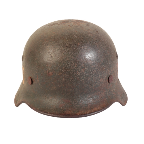 508 - A WWII GERMAN SS HELMET with double decal and original leather lining.