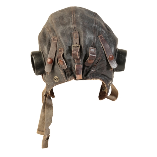 510 - A WWII BROWN LEATHER FLYING HELMET stamped to the leather no. 280/877, with a military crows foot