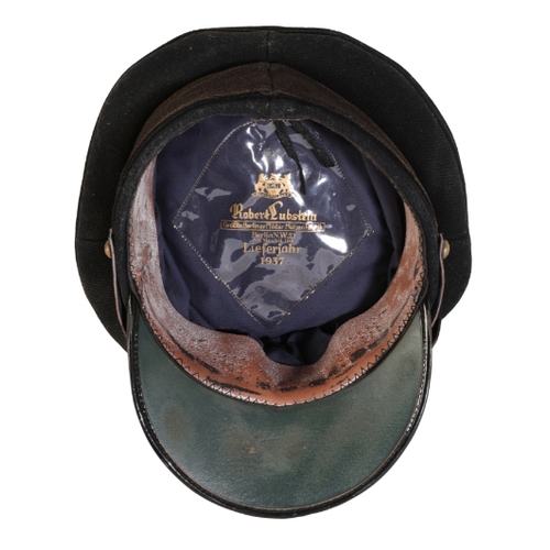 512 - A HIGH QUALITY REPRODUCTION OF A U-BOAT OFFICER VISOR with a U-Boat emblem pin to the side. The make... 