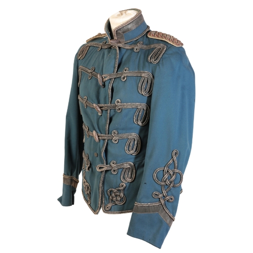 523 - A 19TH CENTURY IMPERIAL GERMAN/PRUSSIAN ARMY OFFICER'S JACKET with epaulettes and blue silk lining.