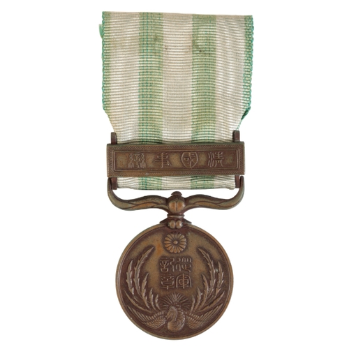 6 - JAPAN. BOXER REBELLION WAR MEDAL, 1900 Japan. Boxer Rebellion War Medal, 1900

The Medal was created... 