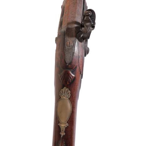 386 - A CONTINENTAL SINGLE BARREL FLINTLOCK SPORTING GUN with walnut stock, Damascus barrel, steel trigger... 