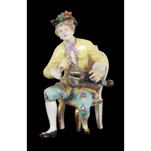 101 - TWO 19TH CENTURY GERMAN PORCELAIN FIGURES comprising a butcher, 12cm high, and a figure of a paintin... 