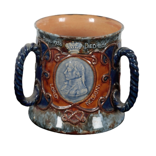 103 - NELSON INTEREST: A COLLECTION OF COMMERATIVE CERAMICS including a Royal Doulton tyg, 17cm high, a Ro... 