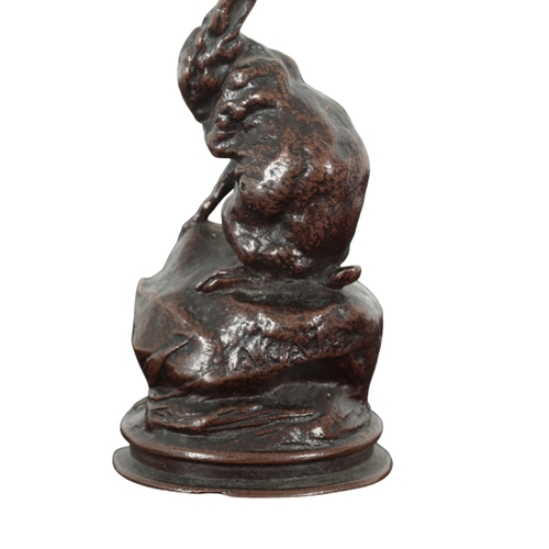 117 - AUGUSTE NICOLAS CAIN (1821-1894) A bronze study of a hare cast naturistically on a rocky outcrop, si... 