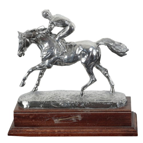 125 - HORSE RACING INTEREST: A FILLED SILVER RACING TROPHY BY D. GEENTY (b.1945) signed by the artist and ... 