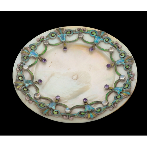 128 - TWO EARLY 20TH CENTURY CONTINENTAL CHAMPLEVE ENAMELLED MOTHER OF PEARL SAUCERS one with scrolled bor... 