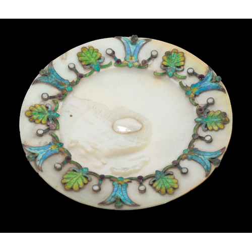 128 - TWO EARLY 20TH CENTURY CONTINENTAL CHAMPLEVE ENAMELLED MOTHER OF PEARL SAUCERS one with scrolled bor... 