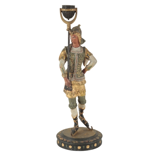 141 - A PAIR OF ITALIAN PAINTED METAL FIGURAL CANDLESTICKS 20th century, modelled as a man and a woman in ... 