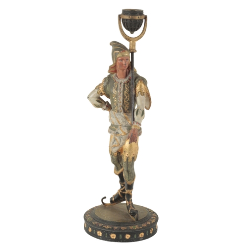 141 - A PAIR OF ITALIAN PAINTED METAL FIGURAL CANDLESTICKS 20th century, modelled as a man and a woman in ... 