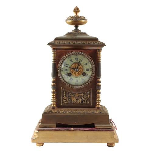 156 - A 19TH CENTURY FRENCH BRASS MANTLE CLOCK BY VINCENZI ET CIE retailed by W Magrett, Paris, the cream ... 