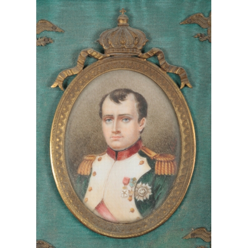 174 - NAPOLEONIC INTEREST: A TRIPTYCH OF PORTRAIT MINIATURES depicting Napoleon to the centre, flanked by ... 