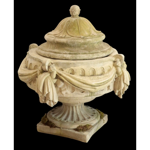 34 - A PAIR OF MASSIVE LIDDED GARDEN URNS the moulded lids with ball finials, the bodies fluted and swagg... 