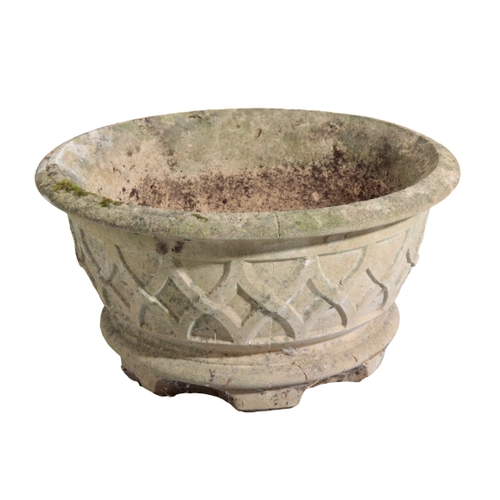 4 - TWO RECONSTITUTED STONE PLANTERS one with a leaf formed bowl on an associated turned socle, 35cm hig... 