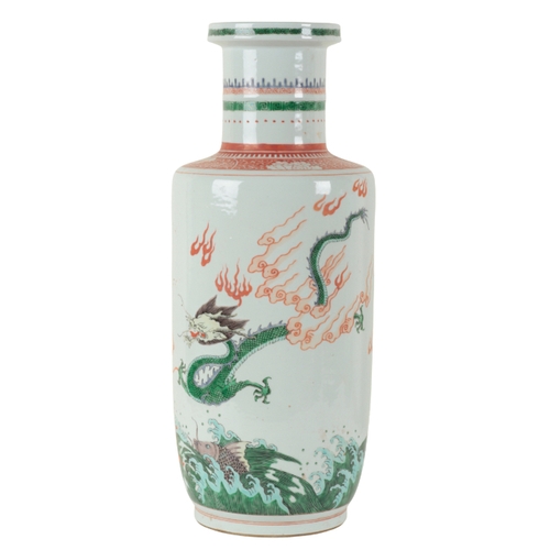 60 - A PAIR OF CHINESE PORCELAIN FAMILLE VERTE VASES each decorated to the body with dragons flying above... 