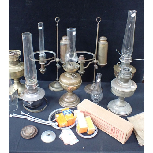 109 - TWO SIMILAR COLZA TYPE OIL LAMPS (a/f), other oil lamps and 'Aladdin' lamp accessories