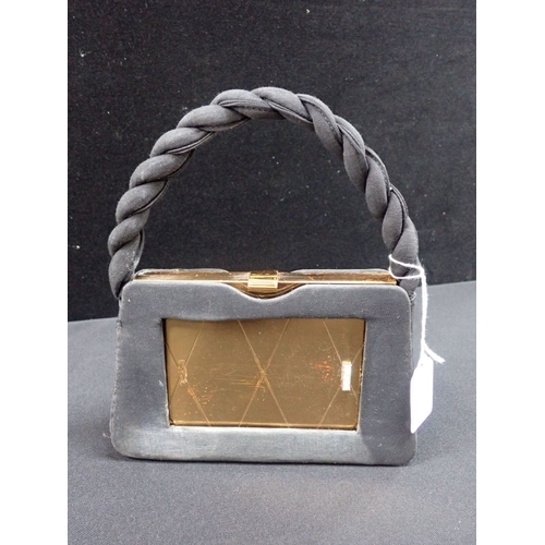 288 - A VINTAGE VOLUPTE EVENING COMPACT, FORMED AS A HANDBAG with diamante decoration (one piece detached ... 