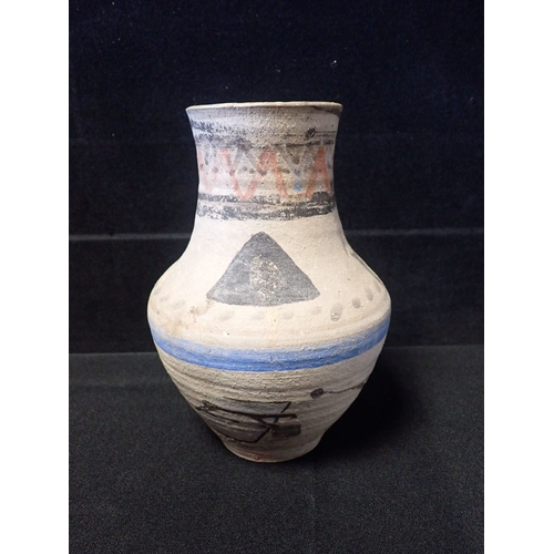 317 - POOLE POTTERY: AN EARLY UNGLAZED CARTER'S VASE LATER DECORATED FOR THE 1964 OLYMPICS in a primitive ... 