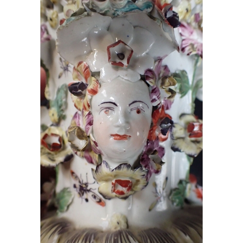 360 - AN 18TH CENTURY FLORAL ENCRUSTED PORCELAIN VASE with reticulated rim and associated cover, 13cm high