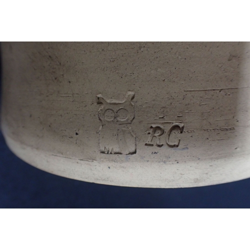 362 - AN RC STUDIO POTTERY TAZZA marked 'RC' with owl motif, 23cms height together with a stuio pottery te... 