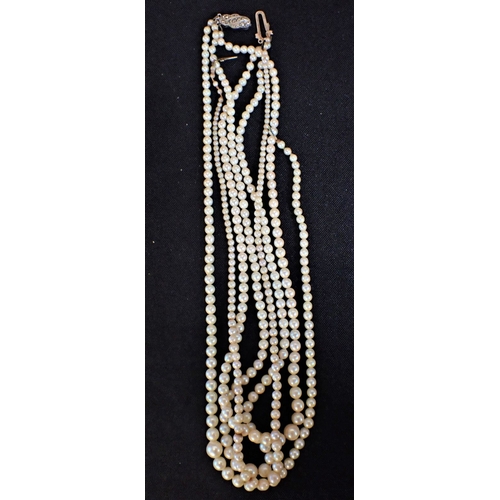 420 - A THREE-ROW GRADUATED PEARL NECKLACE (a/f) and another smaller, and a collection of faux pearls