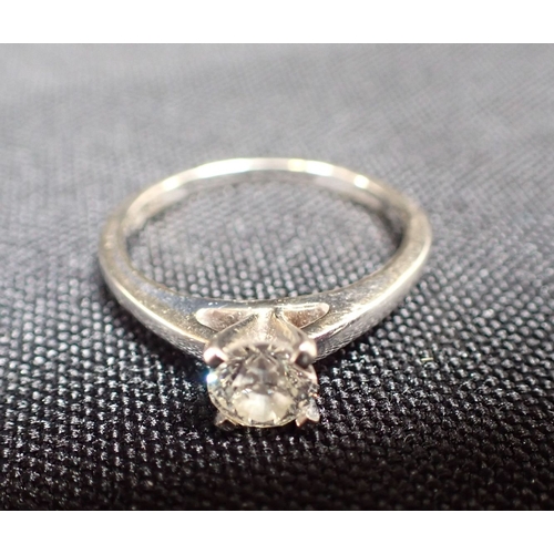 423 - A DIAMOND SOLITAIRE RING the brilliant-cut diamond (c.0.65ct) on an 18ct white gold shank ring size ... 