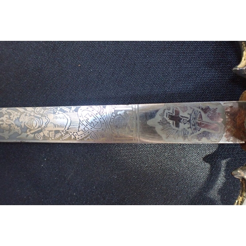 523 - A REPLICA CRUSADER SWORD 19th century, made by W C Lilley & Co, Columbus, Ohio, with ornamental blad... 