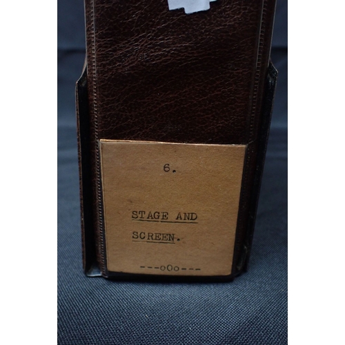 536 - AN ALBERT'S BROWN VINYL CIGARETTE CARD ALBUM containing mixed sets of stage and screen related cards... 