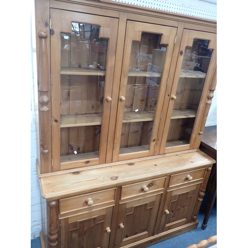 749 - A REPRODUCTION CORNISH STYLE PINE DRESSER with three glazed upper doors, and applied half-columns 15... 