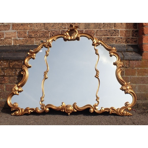 816 - A GILT FRAMED ROCOCO STYLE MIRROR (repro) 110cm wide