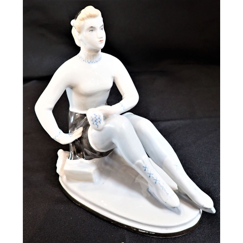 89 - A RUSSIAN PORCELAIN FIGURE OF AN ICE SKATER with other ceramics and sundries