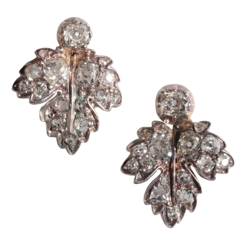 23 - A PAIR OF OLD-CUT DIAMOND EARINGS of leaf form, with single diamond terminal, (c.3grams)