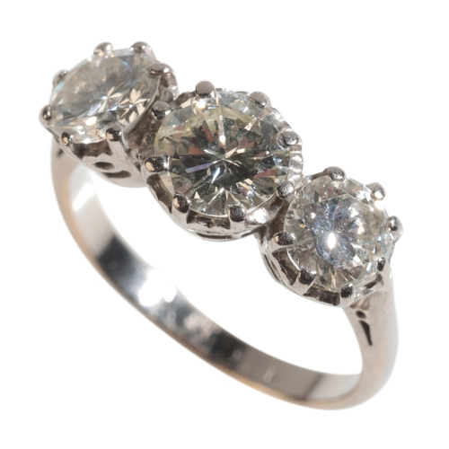 31 - A THREE STONE DIAMOND RING three brilliant-cut diamonds (c.1.55ct total weight) on an 18ct white gol... 