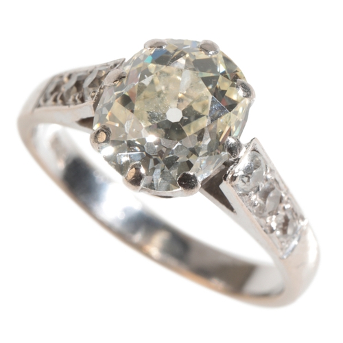 34 - A DIAMOND SOLITAIRE RING the oval-cut diamond (c.2.0ct) on an 18ct white gold shank with diamond-set... 