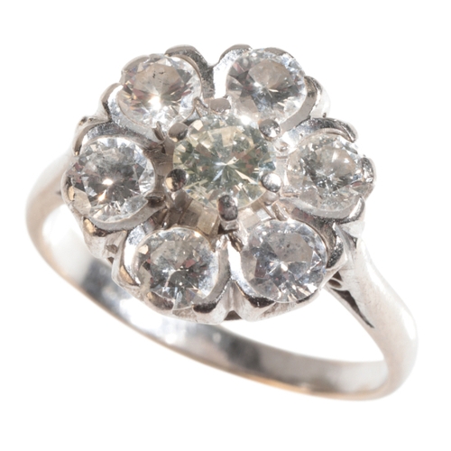 36 - A DIAMOND CLUSTER RING the central brilliant-cut diamond (c.0.40ct) within a border of six further b... 