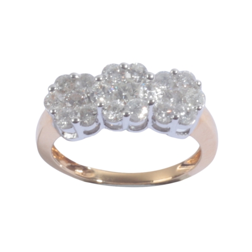 51 - AN 18CT GOLD AND DIAMOND TRIPLE FLORAL CLUSTER RING set with nineteen brilliant-cut diamonds, combin... 