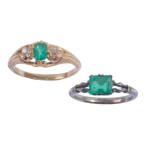 52 - AN EMERALD AND DIAMOND RING the central emerald set with a c. 5pt mine cut diamond either side separ... 