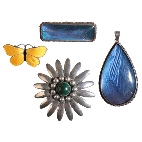 6 - CHRISTIAN FOGH: A DANISH SILVER DAISY BROOCH set to centre with cabochon malachite, 4.5cm diameter, ... 