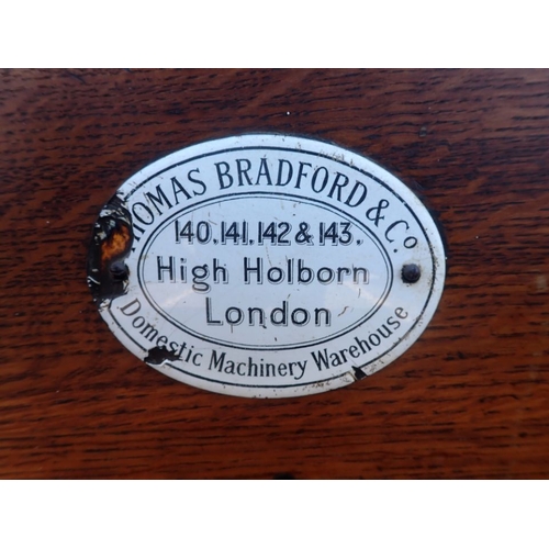 144 - A VICTORIAN KNIFE CLEANING MACHINE RETAILED BY THOMAS BRADFORD & CO. LONDON,oak cased, stamped 'H.W.... 