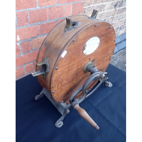 144 - A VICTORIAN KNIFE CLEANING MACHINE RETAILED BY THOMAS BRADFORD & CO. LONDON,oak cased, stamped 'H.W.... 