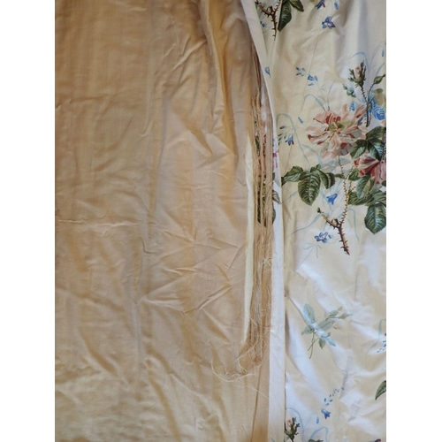 173 - A PAIR OF COUNTRY HOUSE CHINTZ CURTAINS lined and interlined with pencil pleats, some damage to lini... 