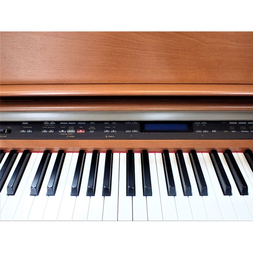 198 - A YAMAHA CLAVINOVA ELECTRIC PIANO; MODEL CLP-970C serial 601125 dated 2001, light wood veneer case 1... 