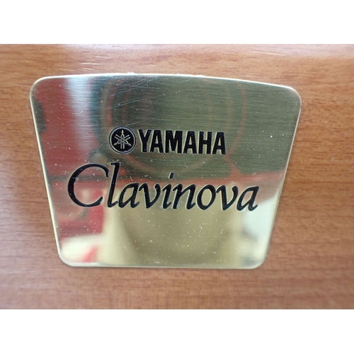 198 - A YAMAHA CLAVINOVA ELECTRIC PIANO; MODEL CLP-970C serial 601125 dated 2001, light wood veneer case 1... 