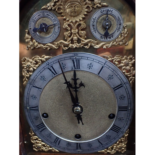 204 - AN OAK-CASED BRACKET CLOCK BY WINTERHALDER & HOFMEIER with Westminster chime and strike on five coil... 