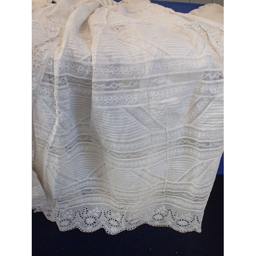 252 - A LACE AND EMBROIDERED CHRISTENTING GOWN mid 19th century, together with two others (some staining) ... 